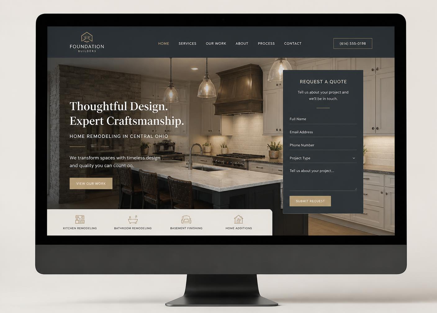 Concept website design for a home remodeling contractor on a desktop monitor, with a finished kitchen photo and a quote form